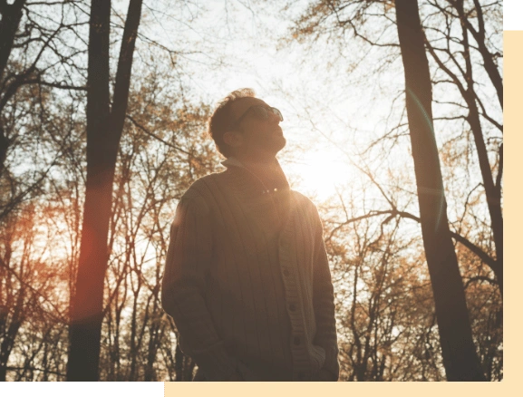 A serene person looking balanced, symbolizing mood stability after receiving bipolar disorder treatment from a psychiatric nurse practitioner in California.