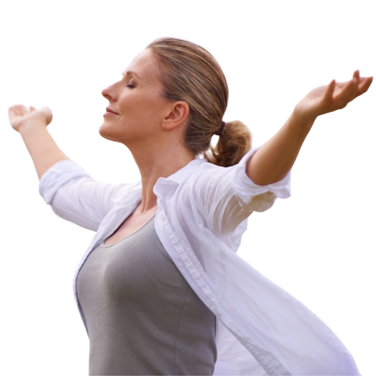 A woman in a joyous pose with outstretched arms, representing emotional freedom after successful medication management in Orange County.