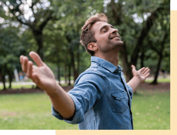 A person enjoying a relaxed moment without checking behaviors, representing successful OCD management via telehealth in California.
